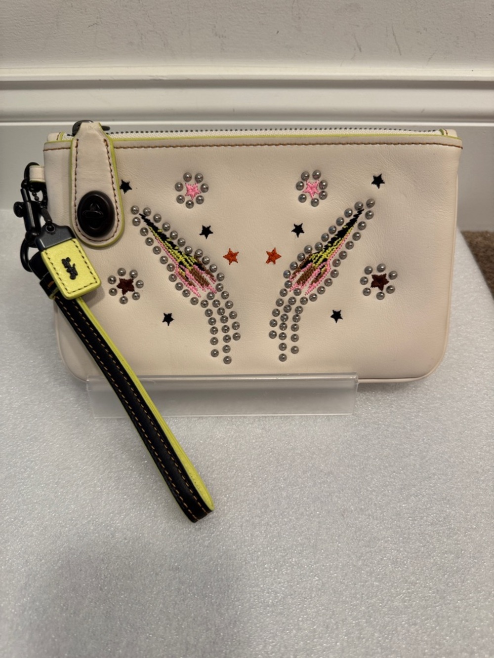 Coach 1941 NASA rocket ship wristlet wallet hangtag